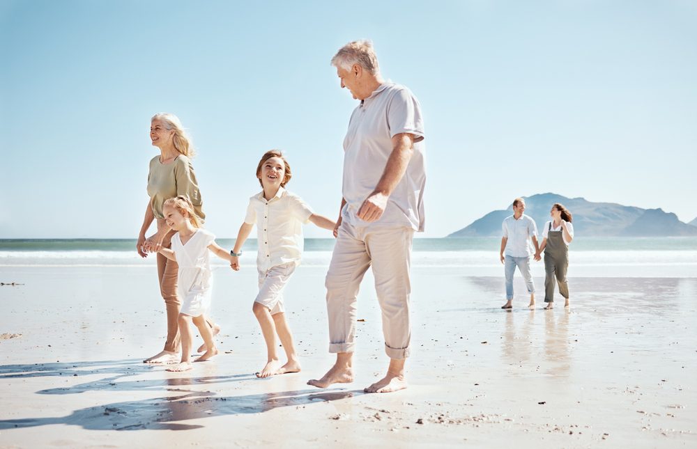 Grandparents,,Kids,And,Holding,Hands,On,Beach,,Family,And,Parents