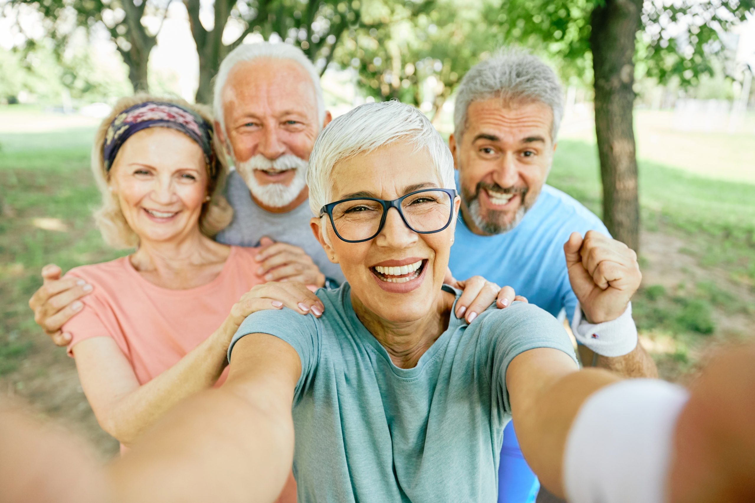 Smiling,Active,Senior,People,Posing,And,Taking,Selfie,Together,In