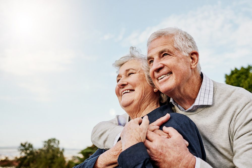 Sky,,Elderly,Couple,And,Hug,Outdoors,Or,Happy,In,Retirement